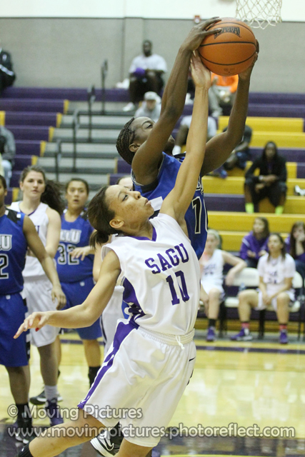 Sam Offord steals the ball from a SAGU defender.
